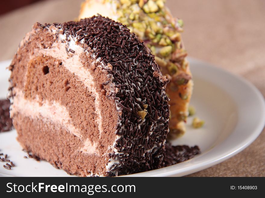 Two pieces of Chocolate & Nuts cake. Two pieces of Chocolate & Nuts cake