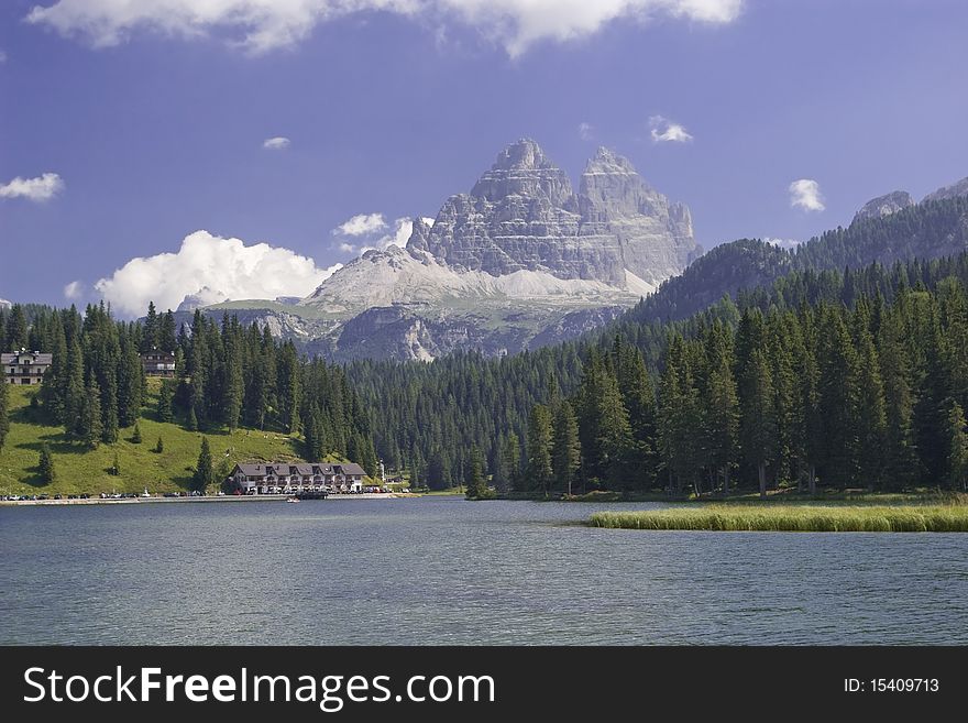 Alps mountain lake in italy, lago di misurina with tre cime di lavaredo in backgroud, in summer