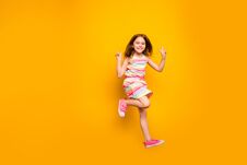 Full Size Photo Of Cheerful Kid Jumping Making V-signs Isolated Over Yellow Background Royalty Free Stock Photo Full Size Photo Of Cheerful Kid Jumping Making V-signs Isolated Over Yellow Background Royalty Free Stock Photo