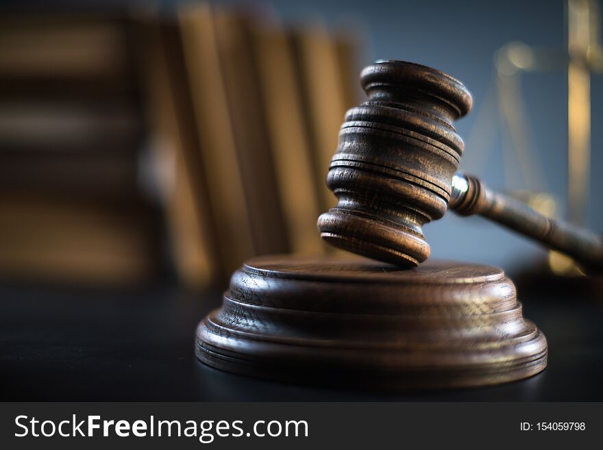 Judges wooden gavel on wooden rustic background. top view. law concept