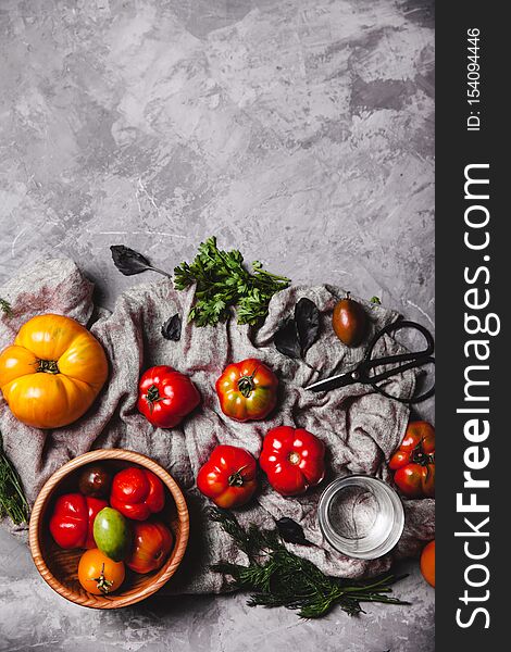 Fresh cherry tomatoes on wooden background