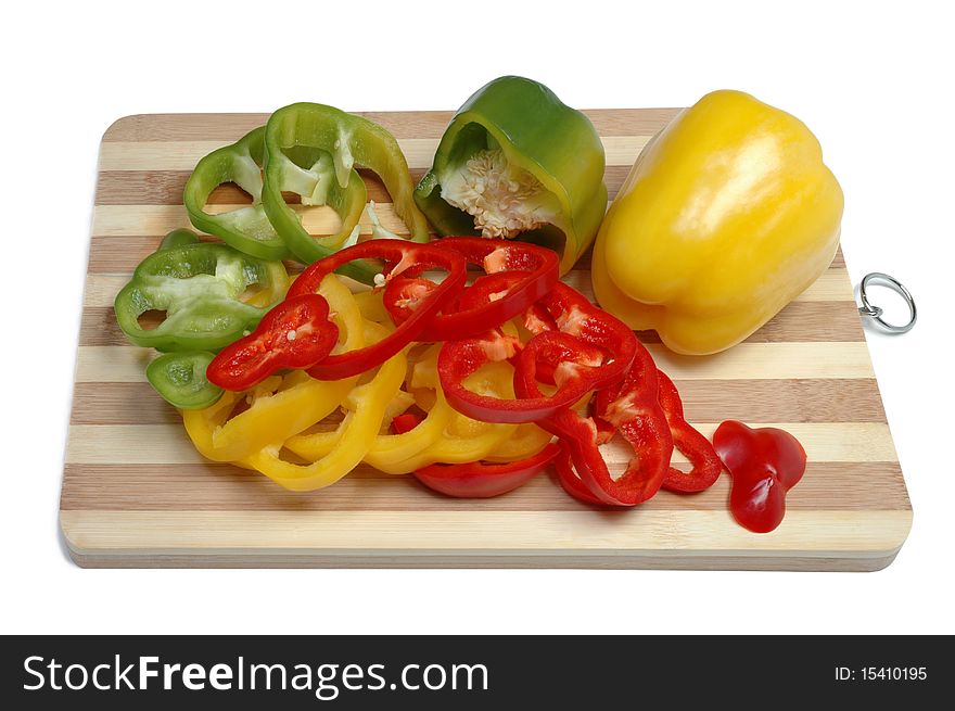 Fresh tasty pepper slices on a kitchen board. Fresh tasty pepper slices on a kitchen board