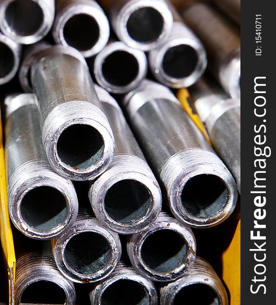 Iron pipes in a shelf, Metallic products