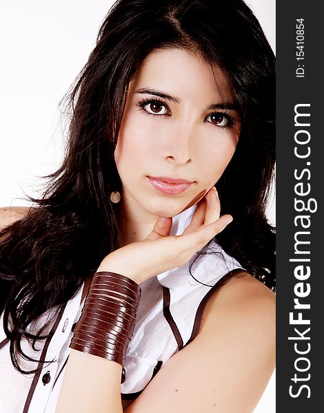 Young girl looking at the camera over white background. Young girl looking at the camera over white background