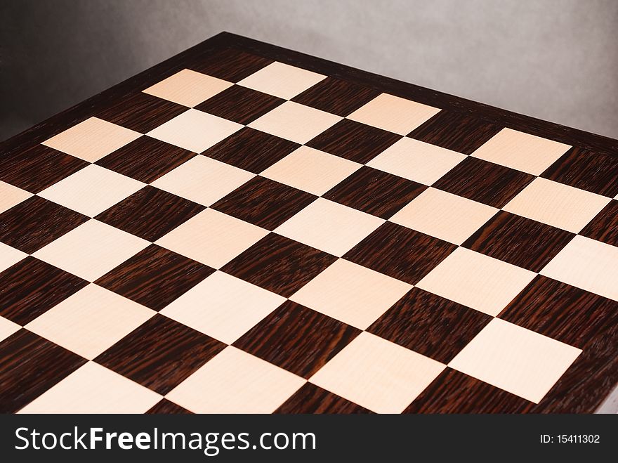 Empty wooden chess board