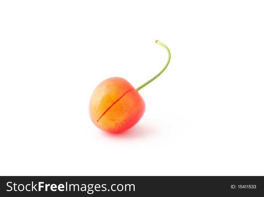 Juicy yellow cherry isolated on white background