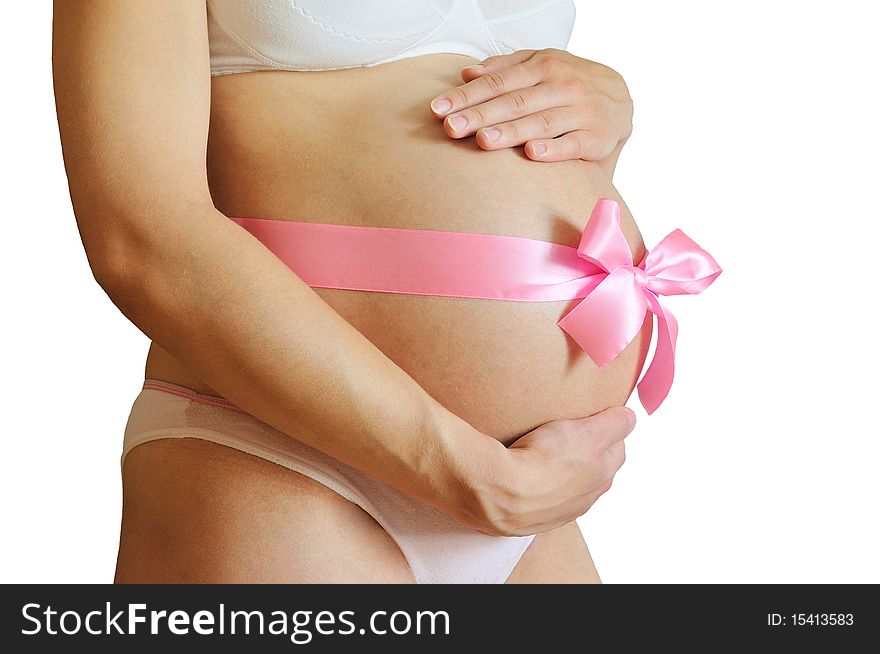 Isolated pregnant woman with a pink bow
