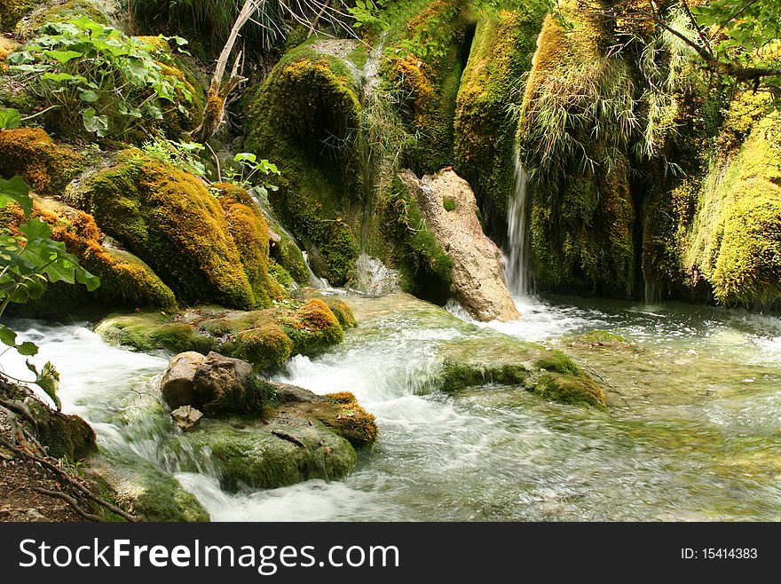 A waterfall flowing into the lake