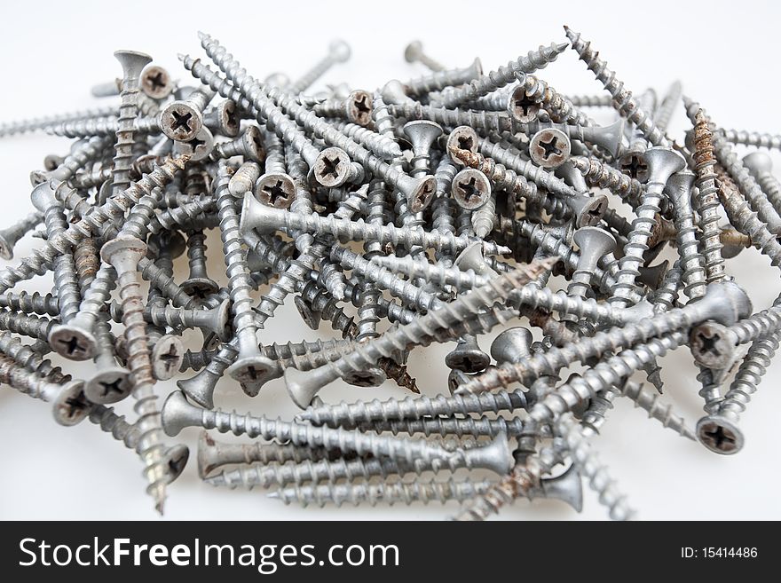 Close up of a pile of metal screws. Close up of a pile of metal screws.