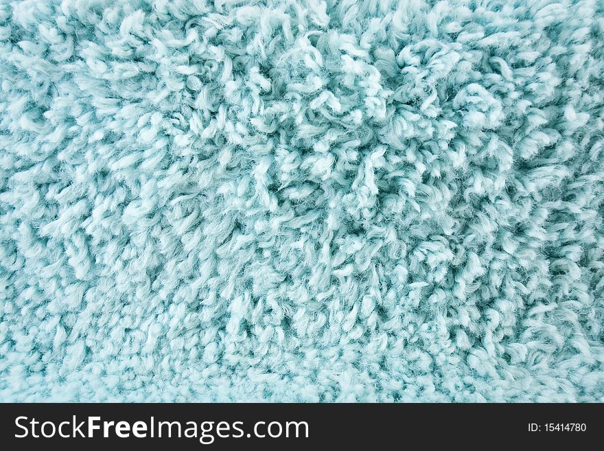 Close up turquoise carpet fabric. Close up turquoise carpet fabric.