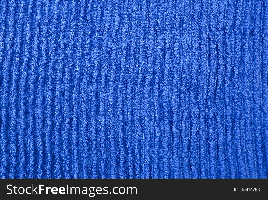 Macro image of blue fabric texture.