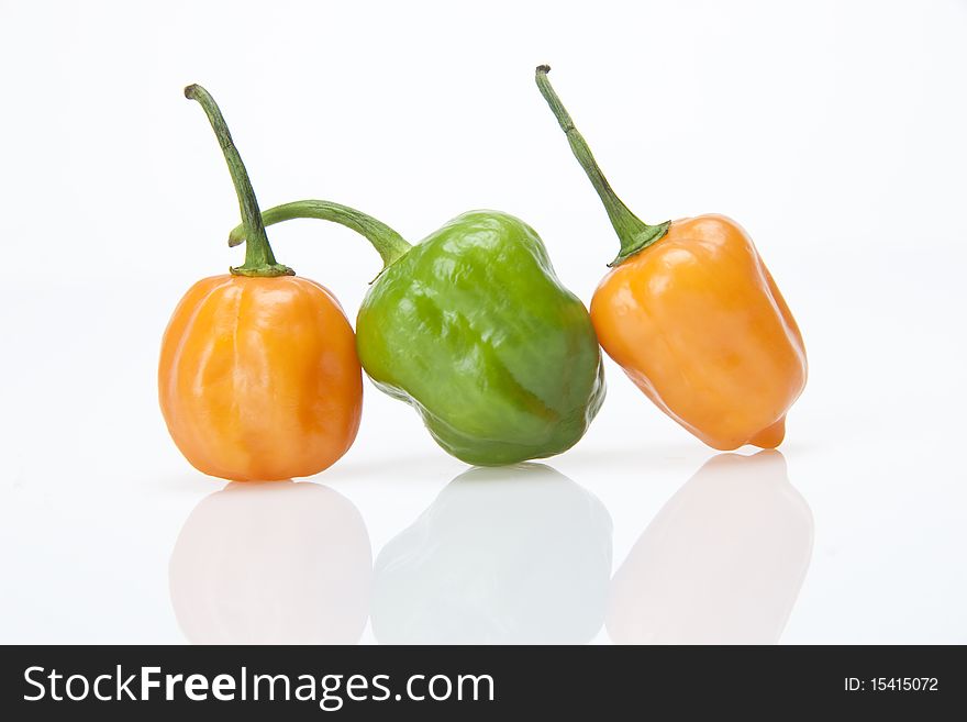 Macro image of colorful mixed peppers.