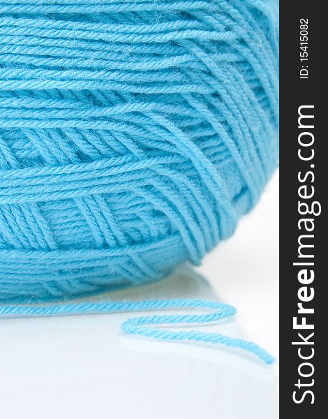 Close up image of blue ball of yarn. Close up image of blue ball of yarn.
