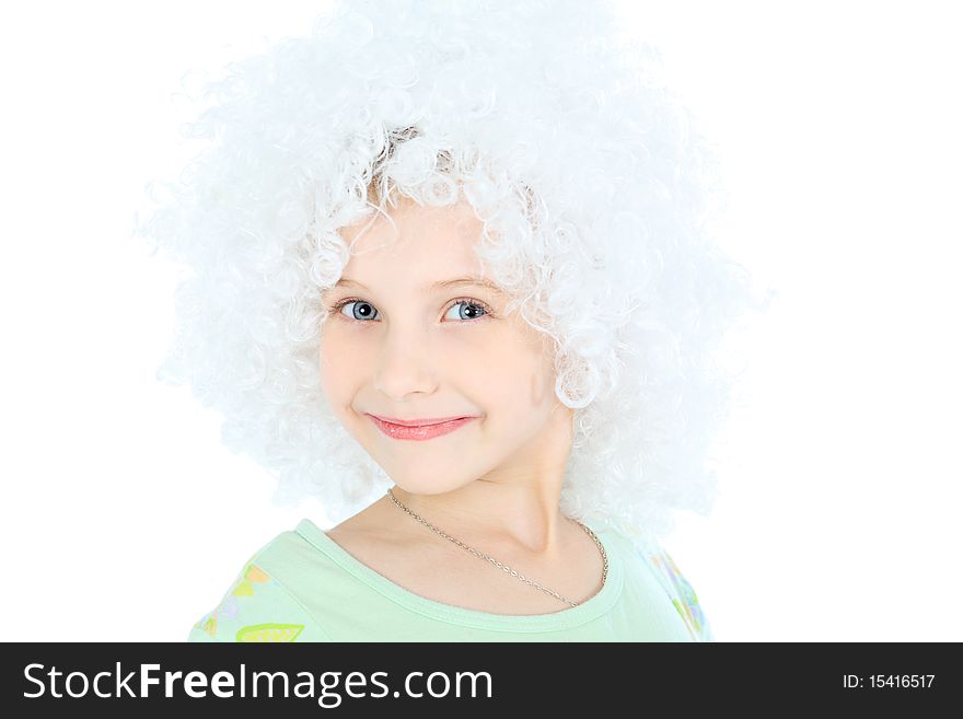 Portrait of a smiley 6 years old girl in white wig. Isolated over white background.