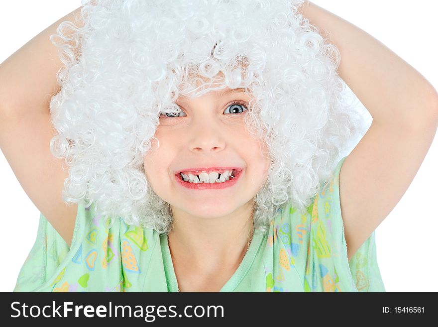 Portrait of a smiley 6 years old girl in white wig. Isolated over white background. Portrait of a smiley 6 years old girl in white wig. Isolated over white background.