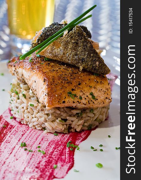 Herb crusted salmon over wild rice pilaf