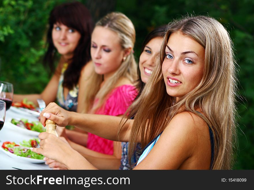 Group of beautiful girls drinking wine