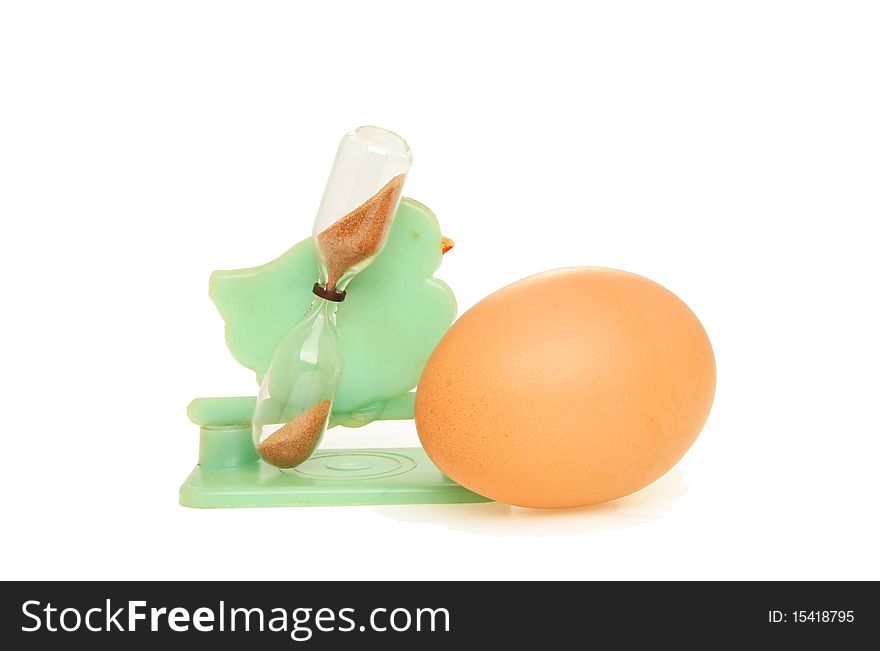Egg and chicken shaped timer against white. Egg and chicken shaped timer against white