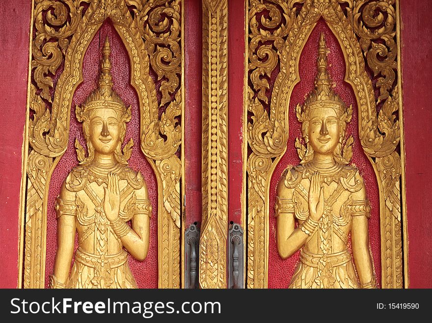 Traditional Thai style molding art
on the door in temple