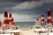 Beach With Deckchairs And Parasols Sea Stock Photo