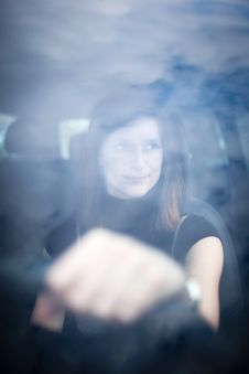 Pretty Young Woman Driving Her  Car Stock Image