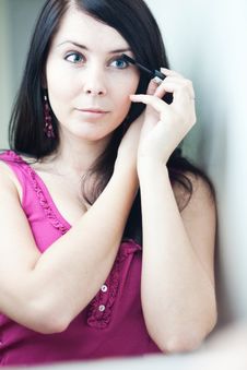 Pretty Young Woman Applying Mascara /eye Shadows Stock Image Pretty Young Woman Applying Mascara /eye Shadows Stock Image