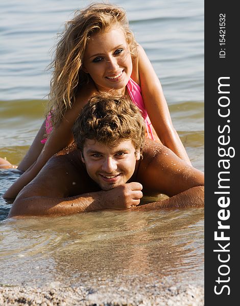 Beautiful Young Couple On The Seaside