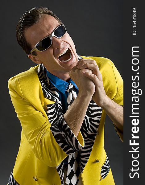 Rockabilly singer from 1950s in yellow jacket