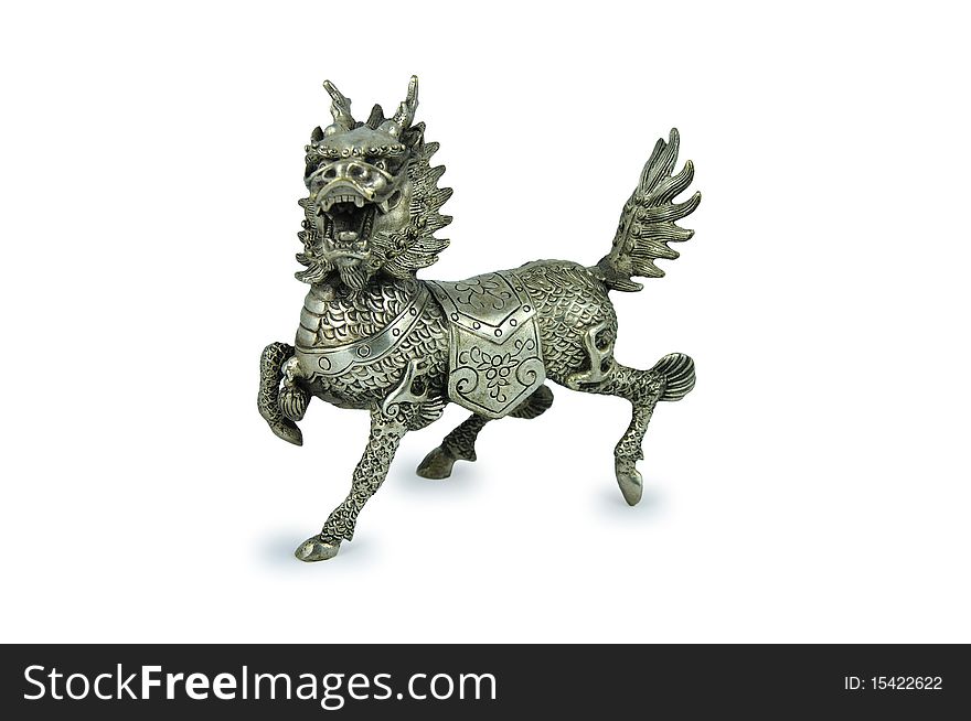 Figurine of a dragon on a white background. Figurine of a dragon on a white background.