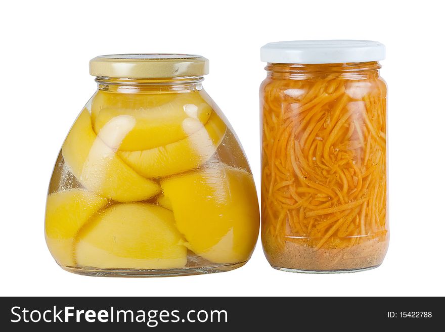 Cans apricots and carrots on a white background. Cans apricots and carrots on a white background