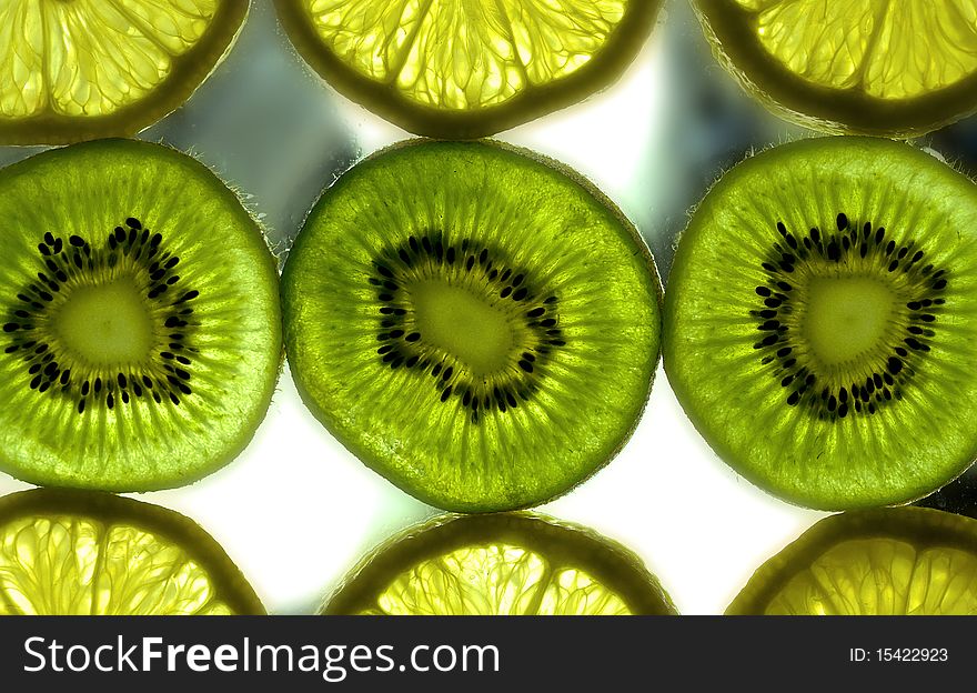 Some slices of fresh fruit on surface. Some slices of fresh fruit on surface