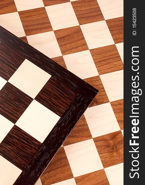 Wooden chess board on white. Wooden chess board on white