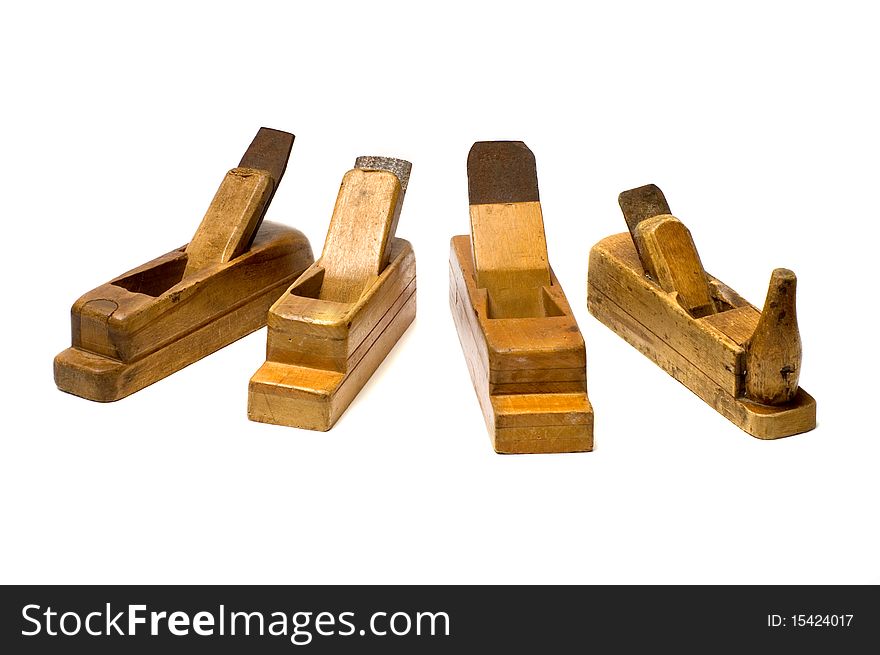 Old wooden planes it is isolated on a white background. Old wooden planes it is isolated on a white background.