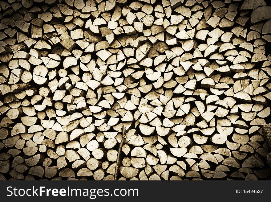 Background with a stack of firewood