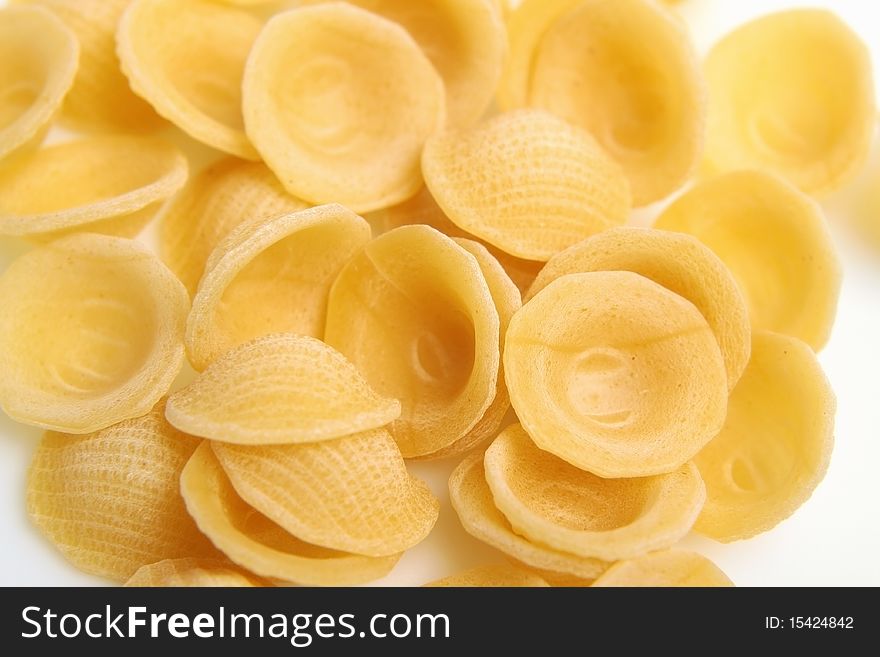Small pasta on a white background