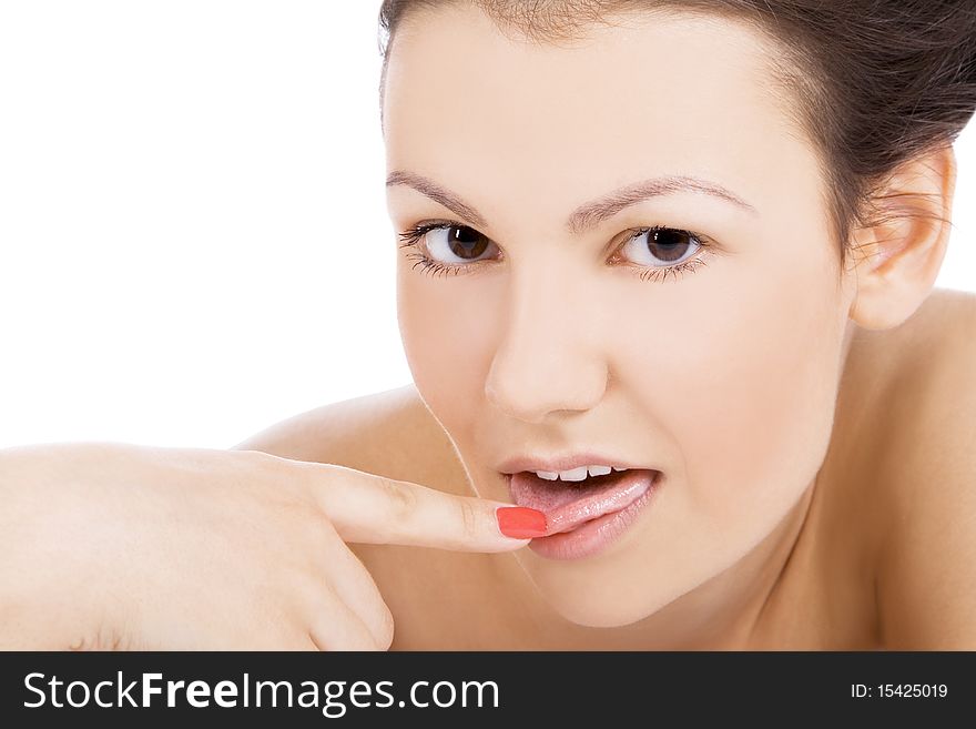 Sexy female face with finger in mouth