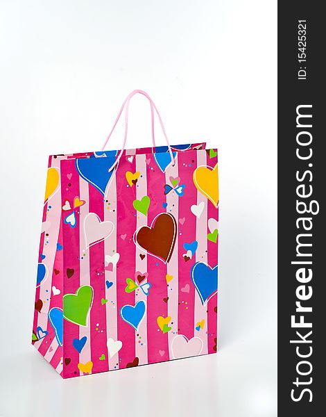 Paper valentine gift bag with hearts