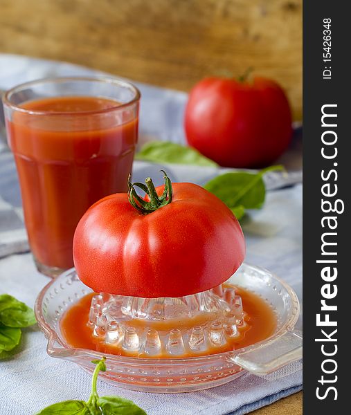 Freshly squeezed tomato juice in glass