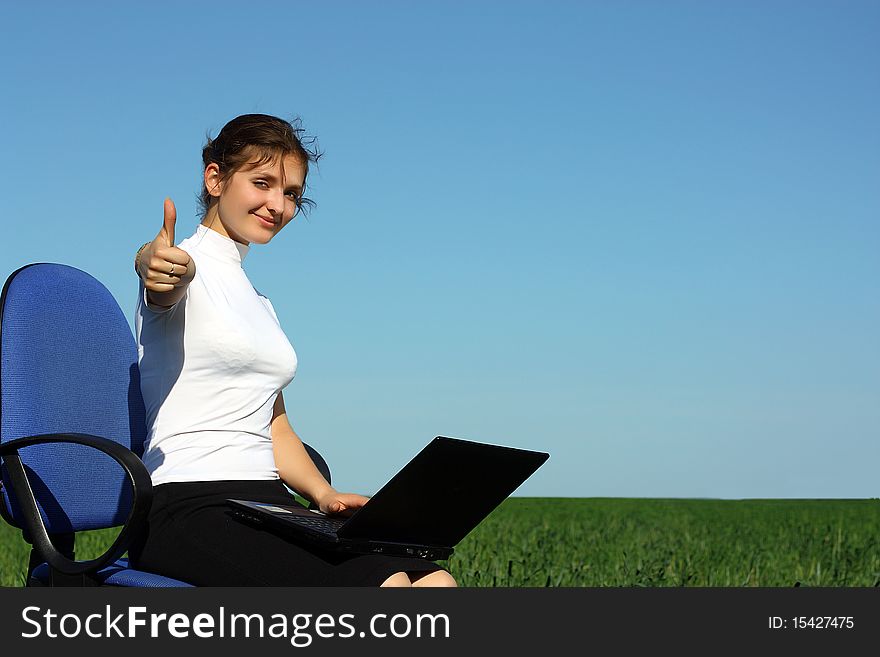 Young woman with laptop outdoor. Young woman with laptop outdoor