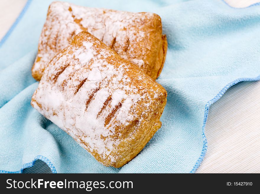 Two puff pastry with sugar powder