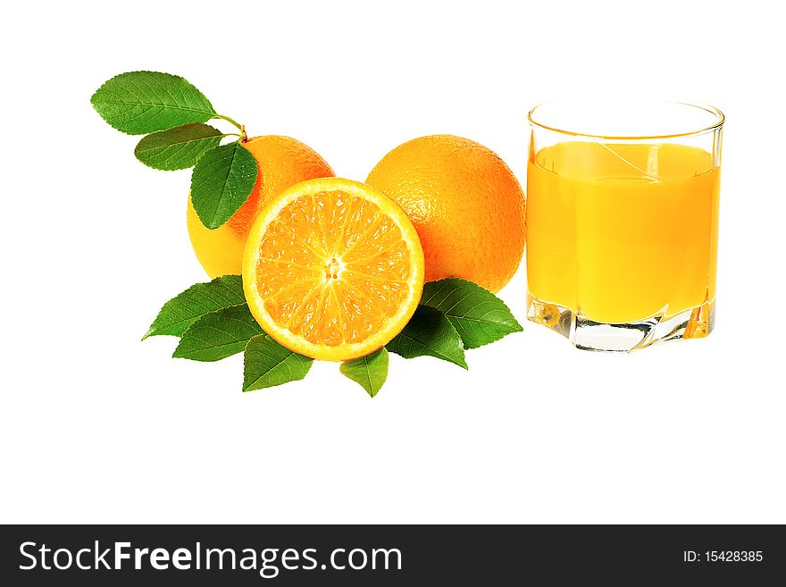 Fresh oranges with a glass of orange juice isolated over white background. Fresh oranges with a glass of orange juice isolated over white background.