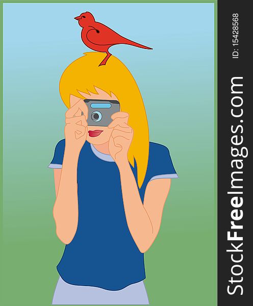Girl with camera in her hands and red bird on her head. Girl with camera in her hands and red bird on her head