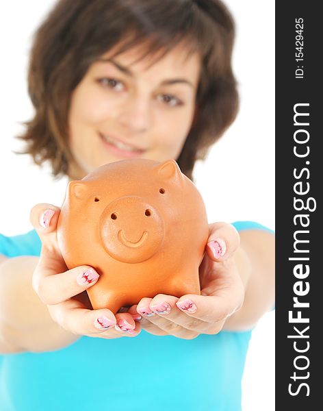 Picture of lovely woman with piggy bank