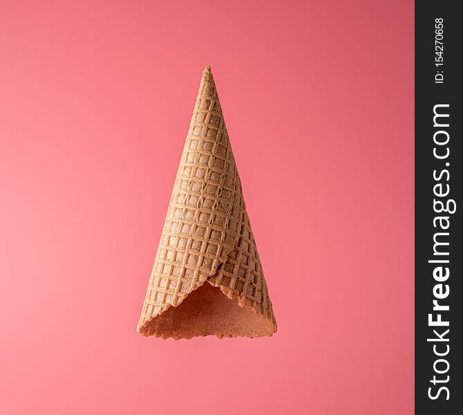 Upside Down Ice Cream Cone On Bright Background. Minimal Summer Concept