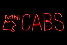 Mini Cabs Neon Sign Stock Photography