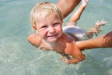 Happy Baby Swimming Stock Photos