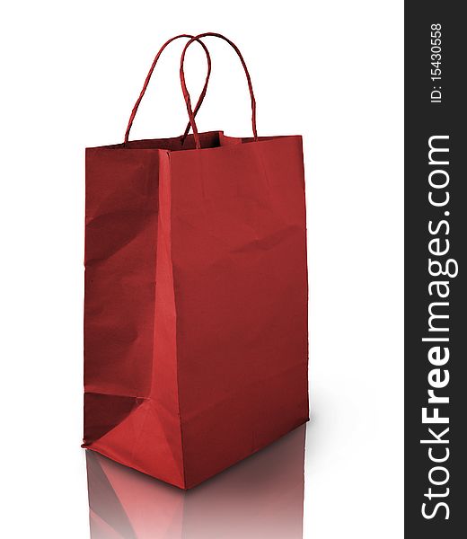 Red Crumpled paper bag on reflect floor