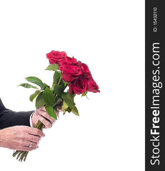 Bouquet of red roses offered by man
