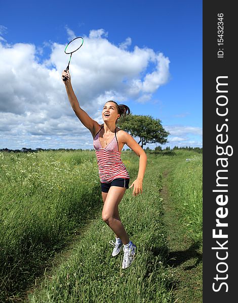 Beautiful Girl Playing Badminton, outdoor