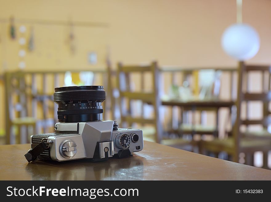 Old SLR lying on a table